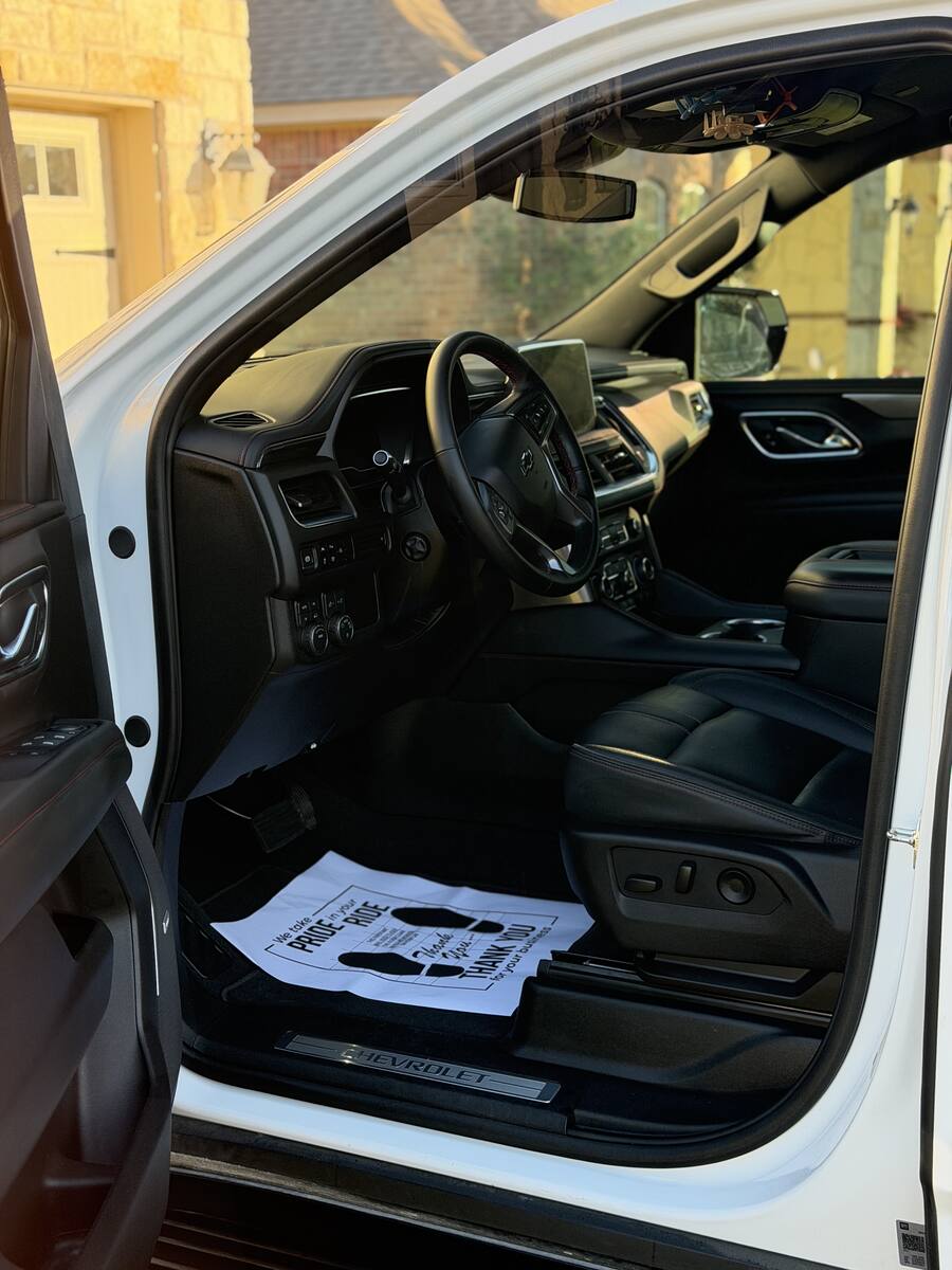 NxtLvl Detailing branded floor mat inside a freshly detailed vehicle